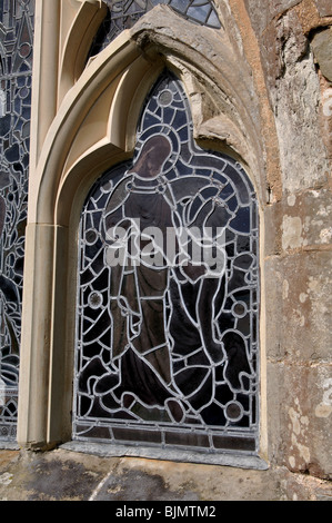 Stained glass window seen from outside, St. Mary`s Church, Lapworth, West Midlands, England, UK Stock Photo